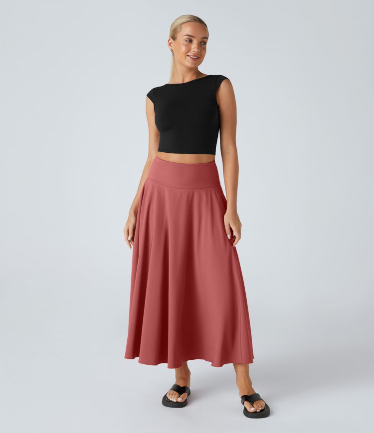 Falda midi Breezeful™ 2 en 1 fluida secado rápido bolsillo lateral trasero tiro alto