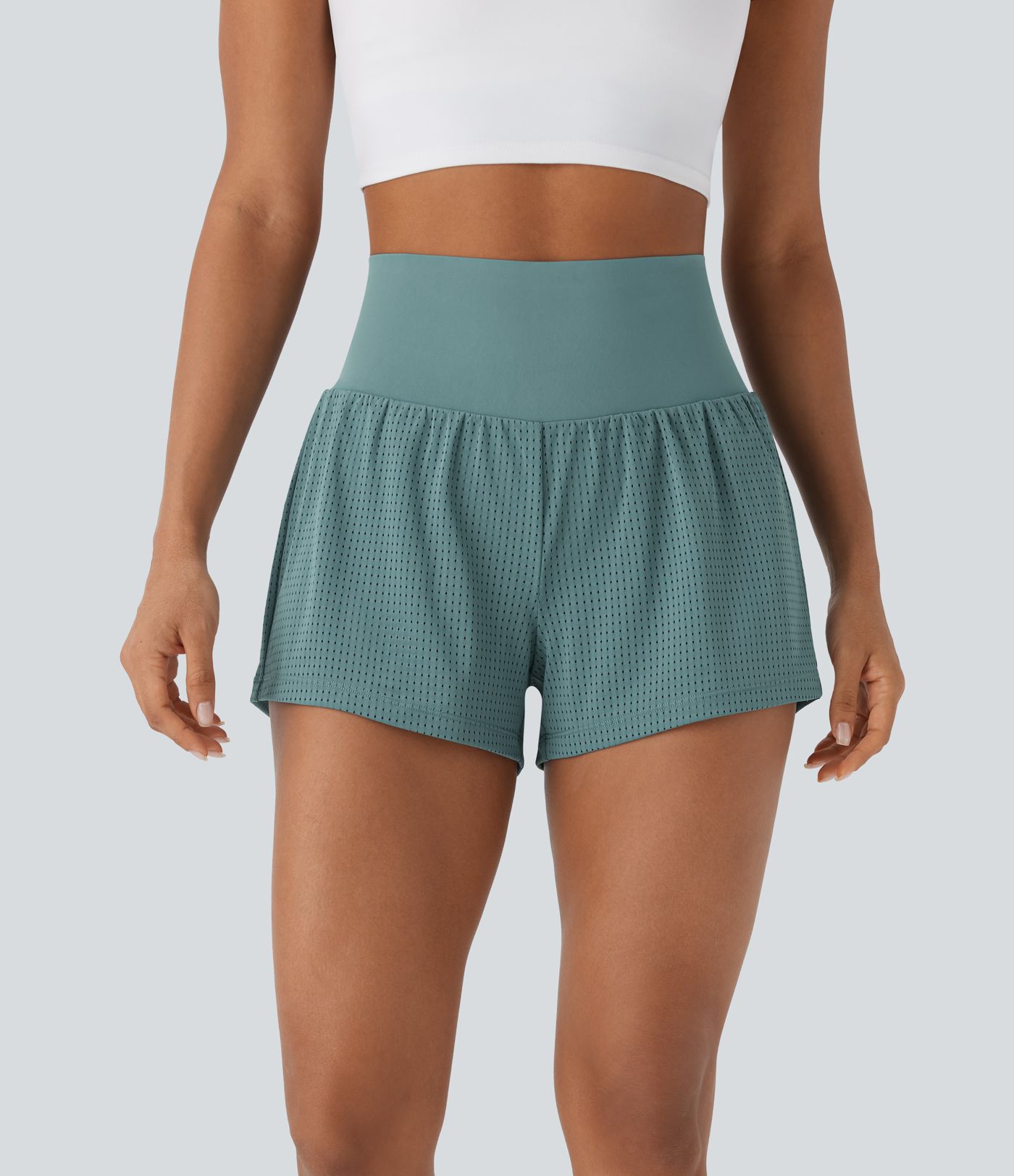 Shorts de yoga 2 en 1 con moldeador de abdomen y tiro alto con detalles perforados