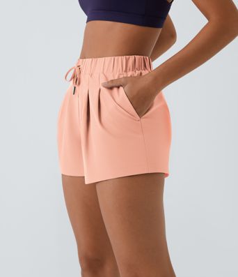 Mid-rise casual shorts with elastic waistband and drawstring, ruched side pockets, 7.6 cm