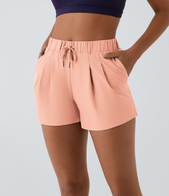 Mid-rise casual shorts with elastic waistband and drawstring, ruched side pockets, 7.6 cm