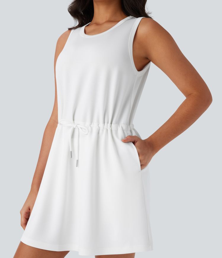 Vestido corto de yoga de dos piezas, sin mangas, con cuello redondo y bolsillos laterales con cordón ajustable