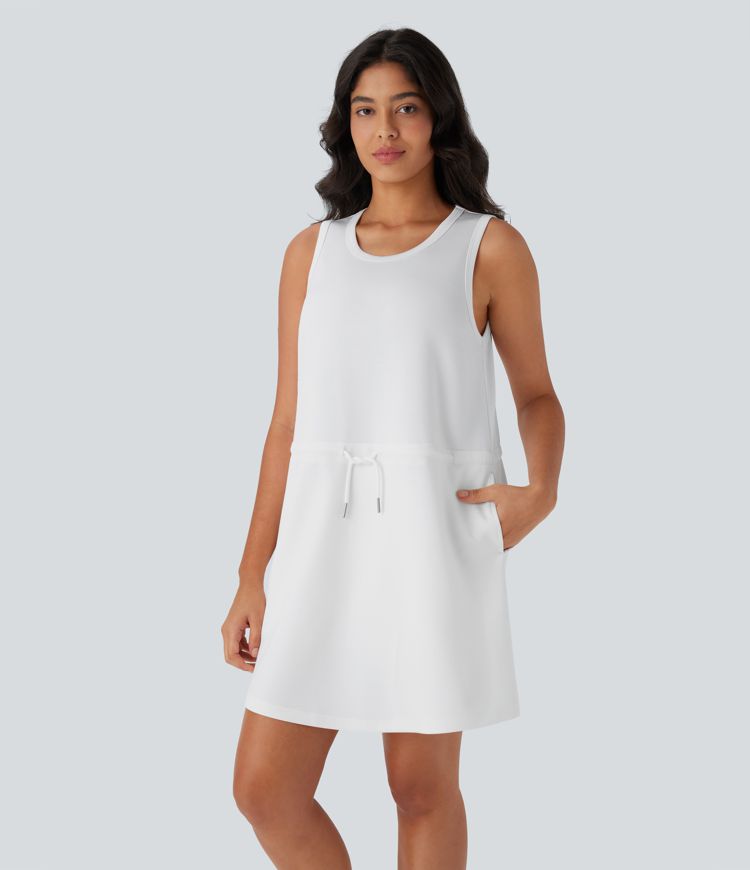 Vestido corto de yoga de dos piezas, sin mangas, con cuello redondo y bolsillos laterales con cordón ajustable