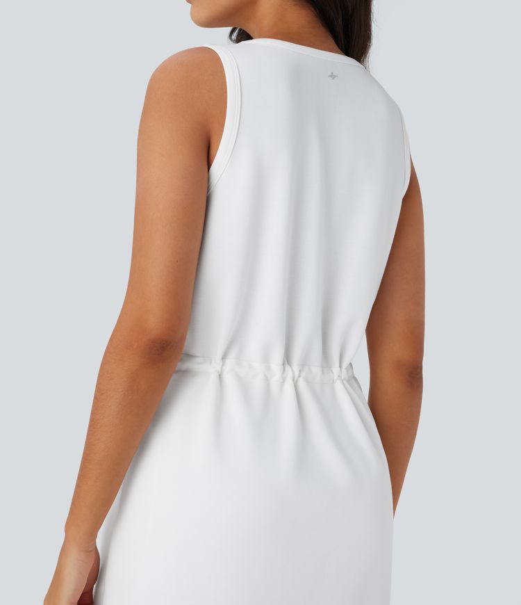 Vestido corto de yoga de dos piezas, sin mangas, con cuello redondo y bolsillos laterales con cordón ajustable