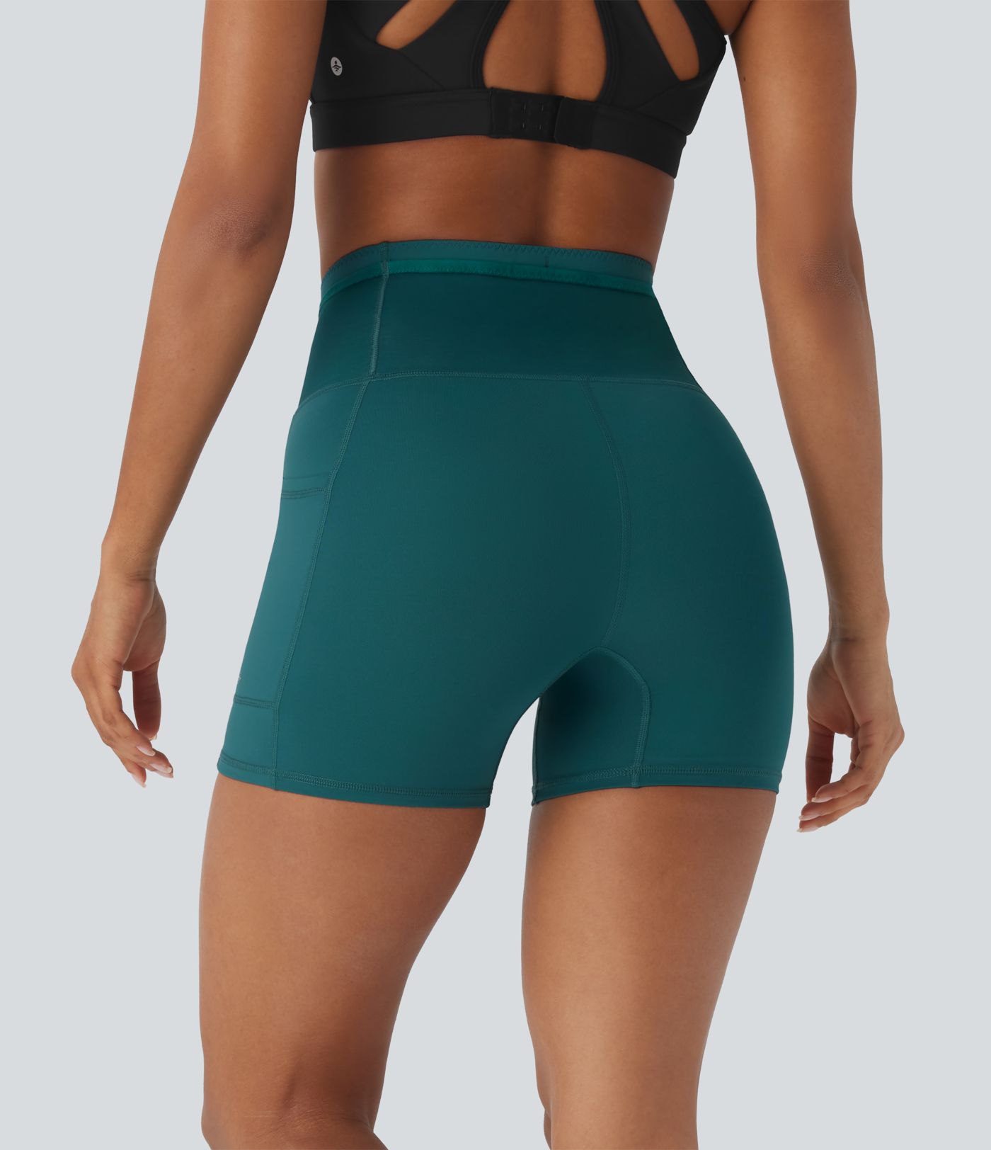 Shorts tipo biker de running SpeedWave™ de tiro alto moldeador abdominal  con malla de contraste y de secado rápido en longitud 12,7cm y bolsillos 360°