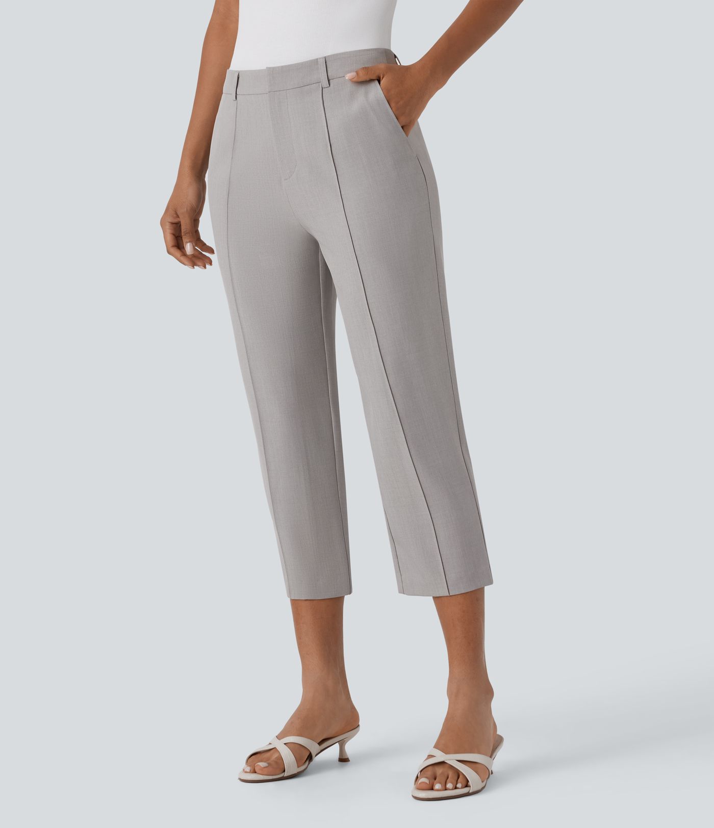 Pantalón capri tiro medio cremallera múltiple bolsillo