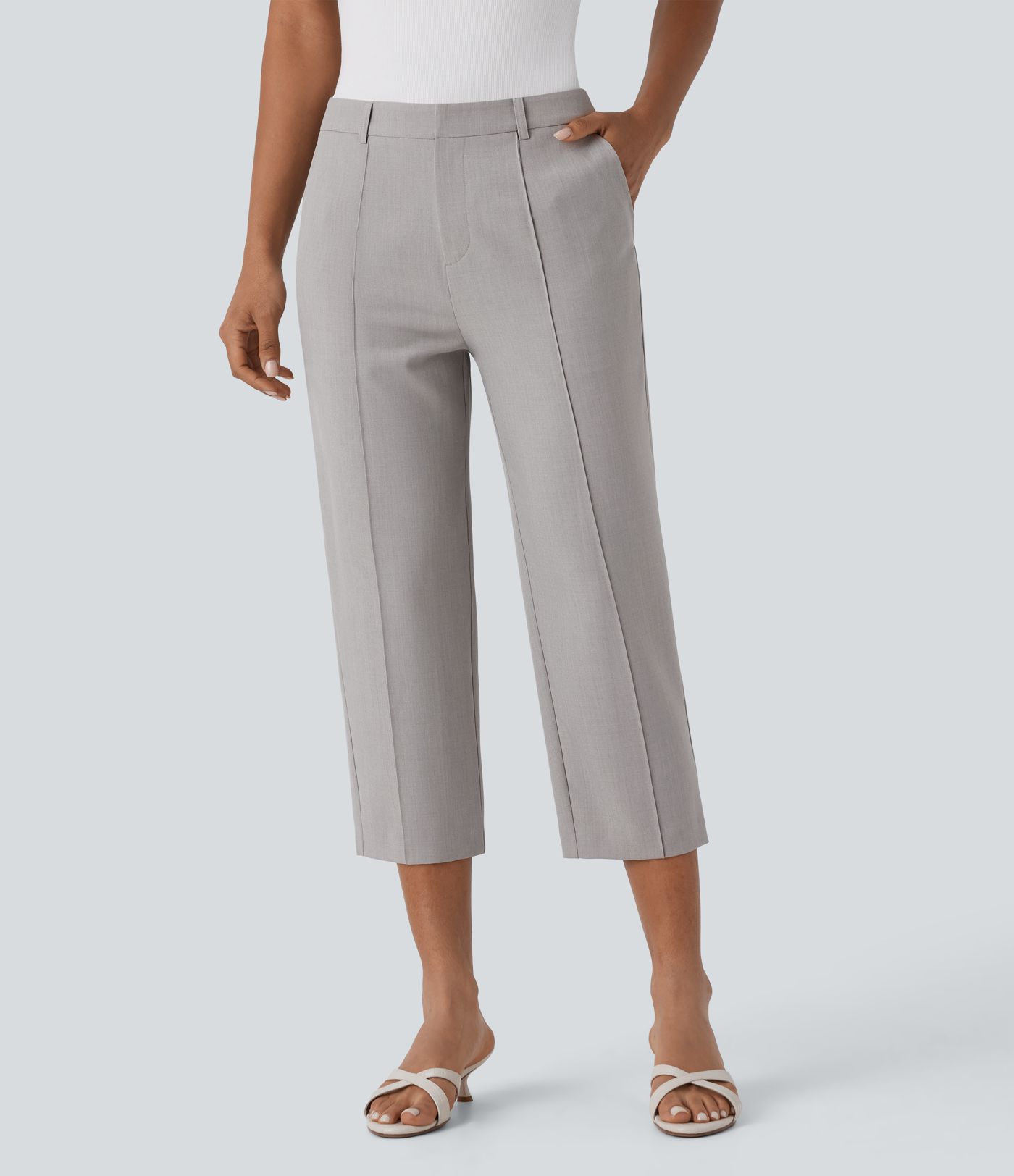 Pantalón capri tiro medio cremallera múltiple bolsillo