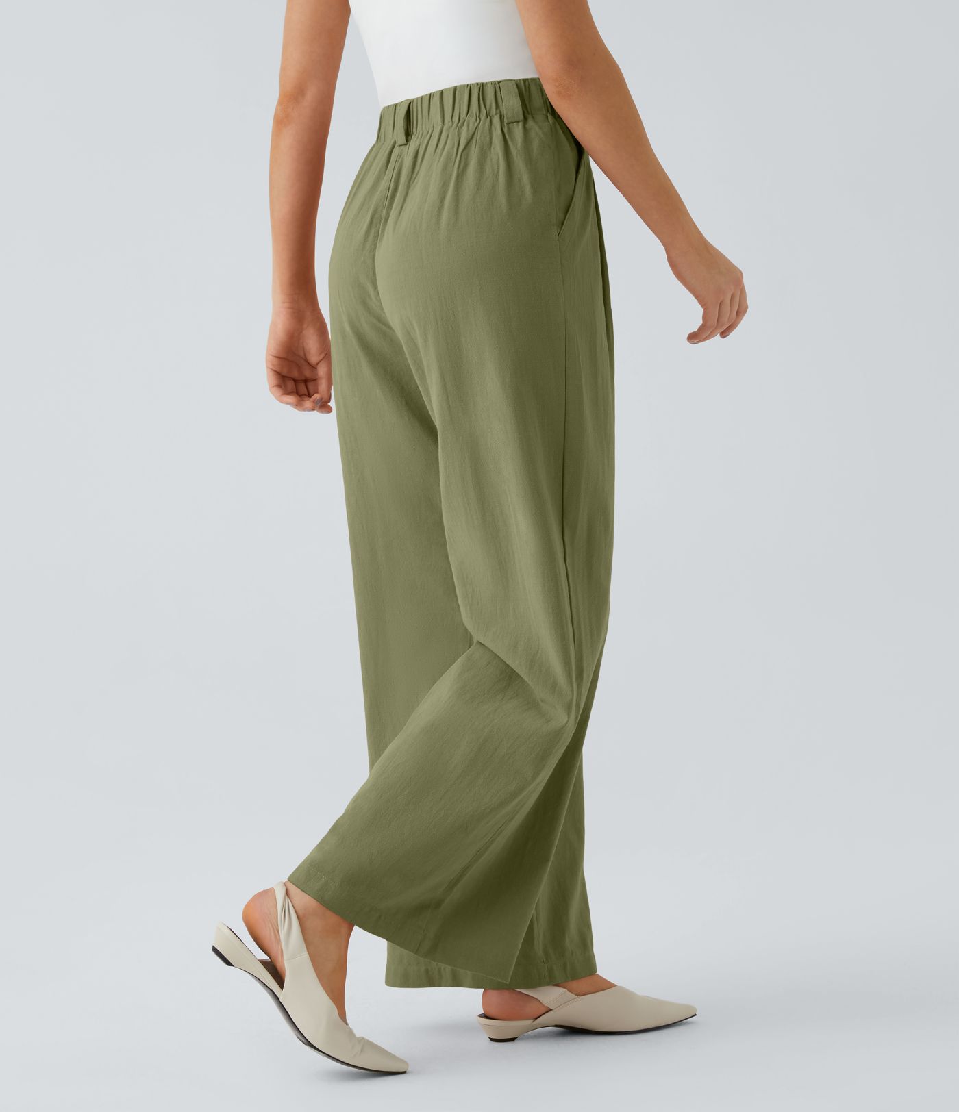 Pantalón tiro alto bolsillo lateral plisado pierna ancha