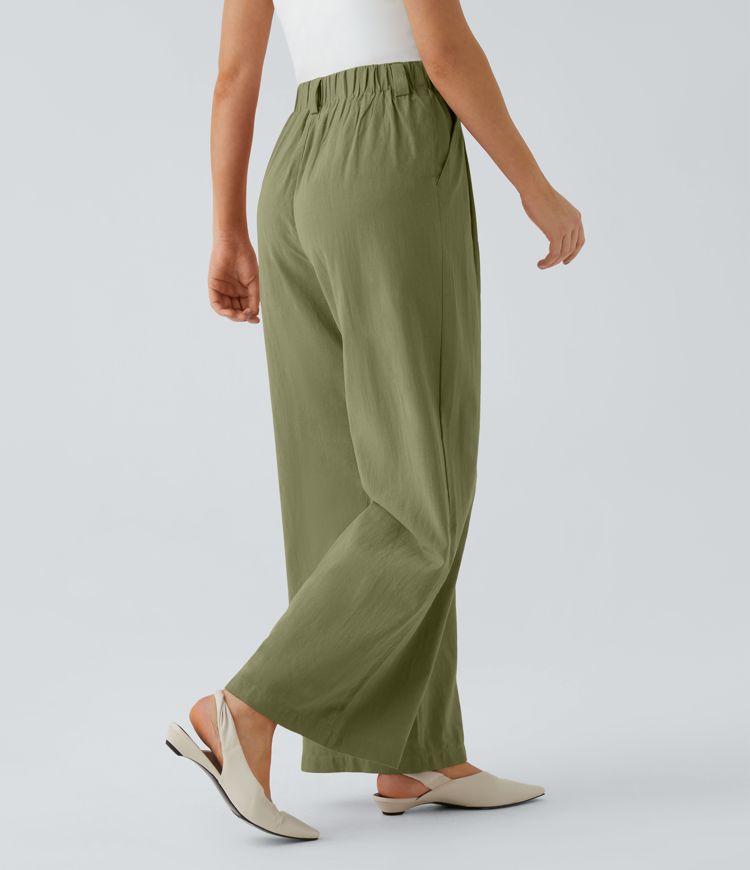 Pantalón tiro alto bolsillo lateral plisado pierna ancha