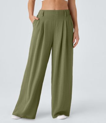 Pantalón tiro alto bolsillo lateral plisado pierna ancha