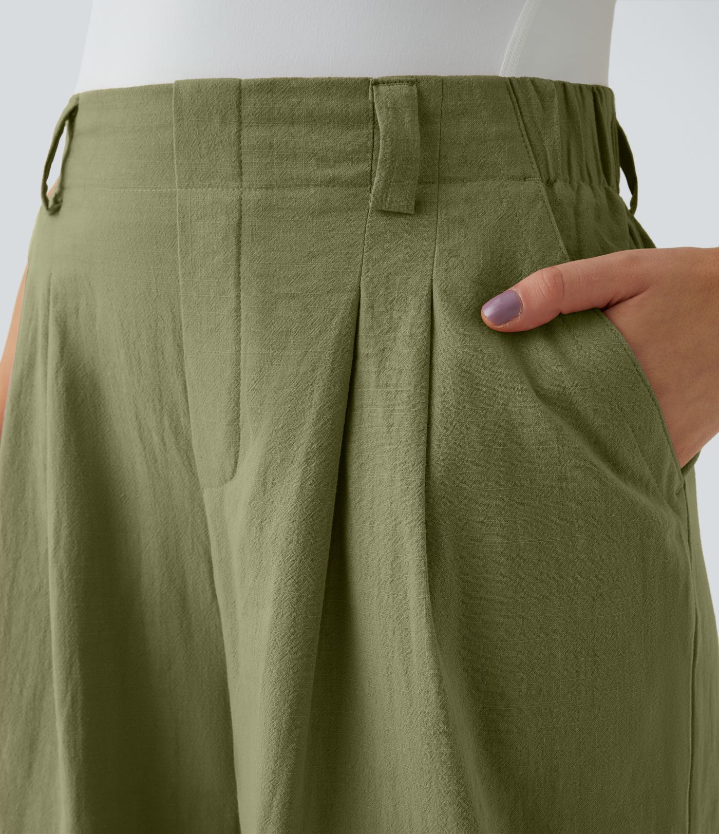 Pantalón tiro alto bolsillo lateral plisado pierna ancha