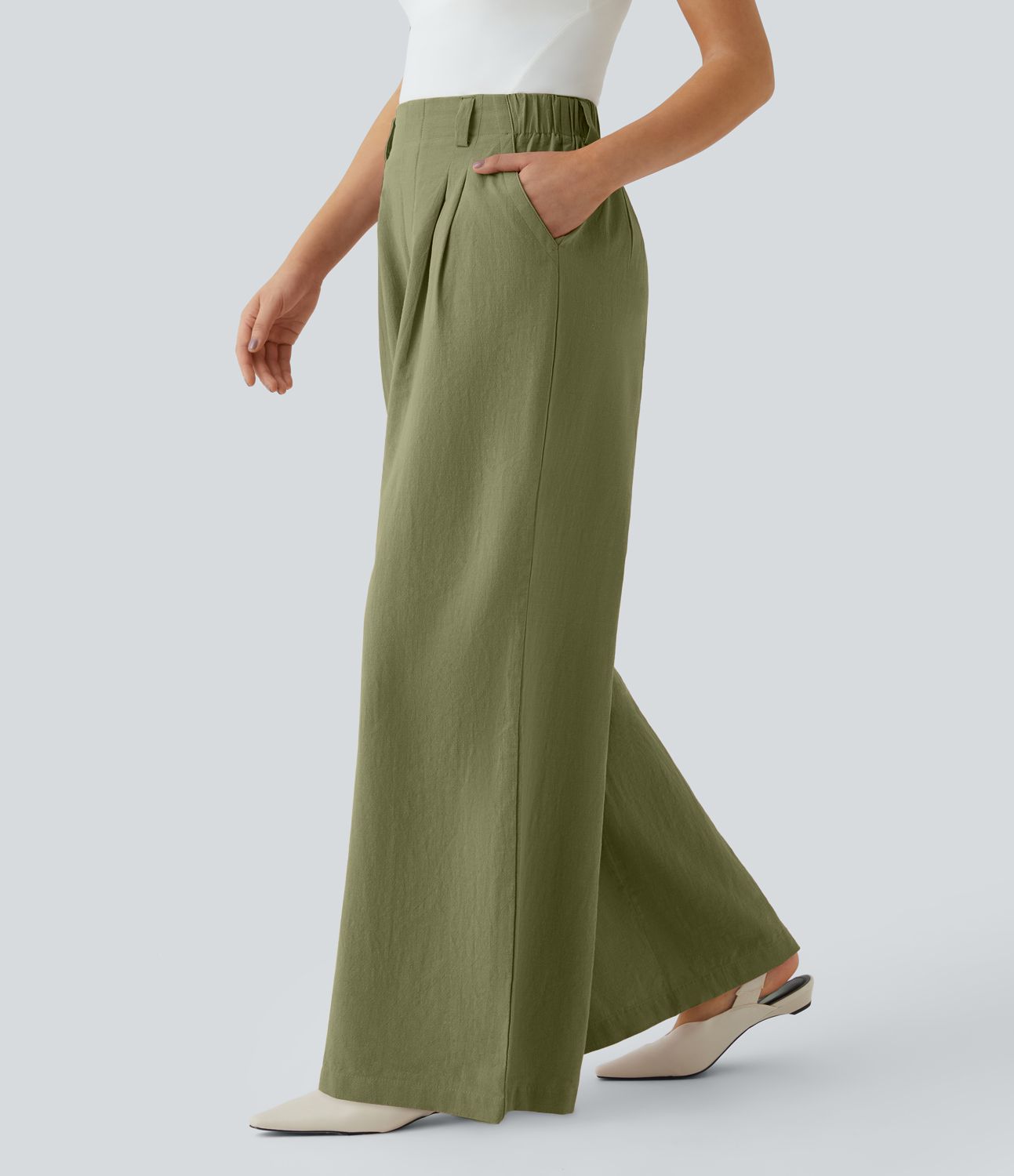 Pantalón tiro alto bolsillo lateral plisado pierna ancha