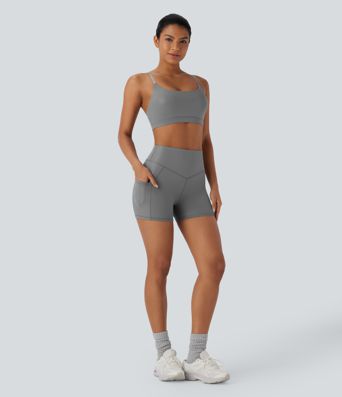 Shorts de yoga de cuero sintético de tiro alto y bolsillos laterales de 10,6cm de longitud