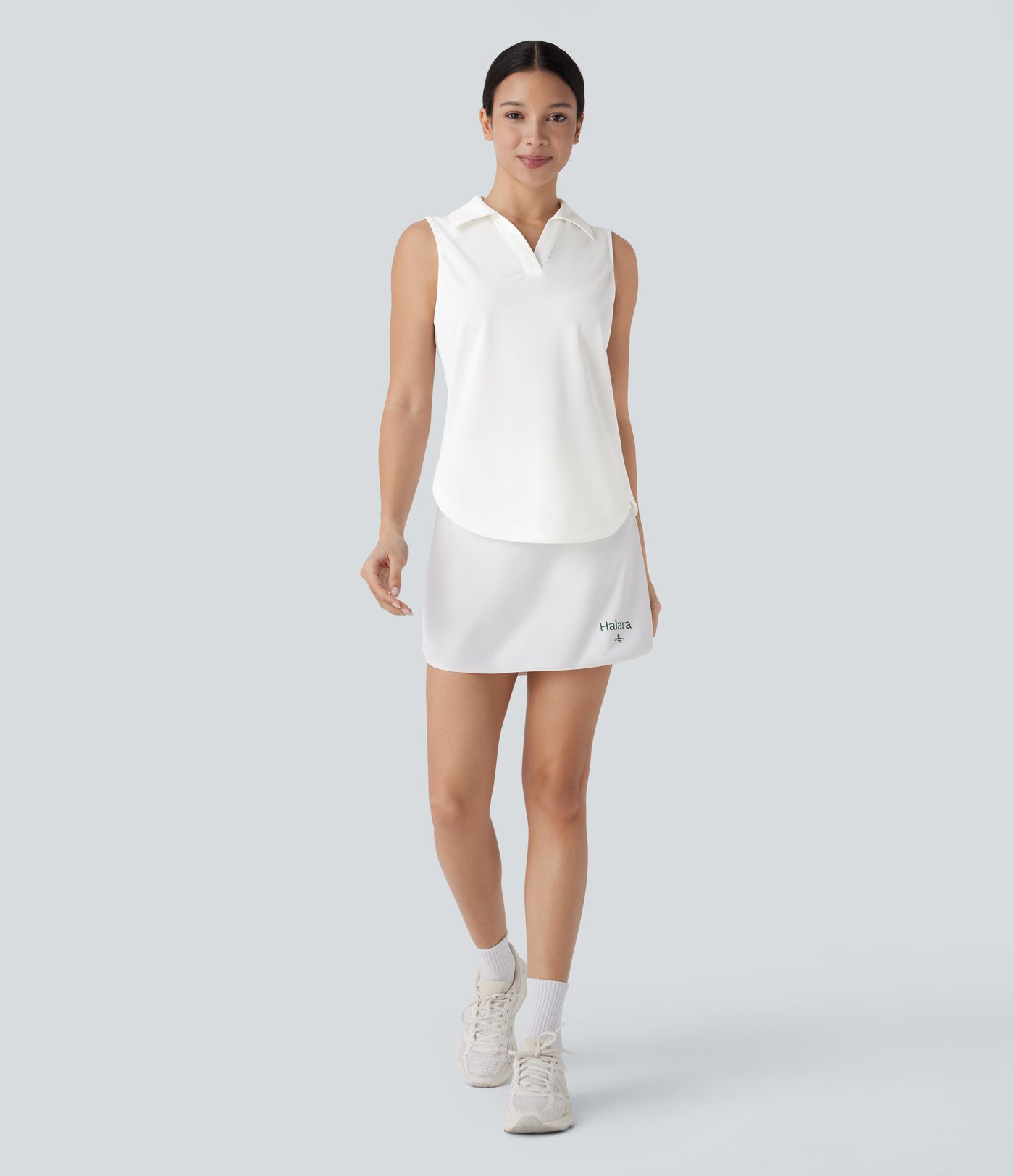 Crossover-Golf-Tanktop mit V-Ausschnitt und gebogenem Saum - schnelltrocknend, UPF50+