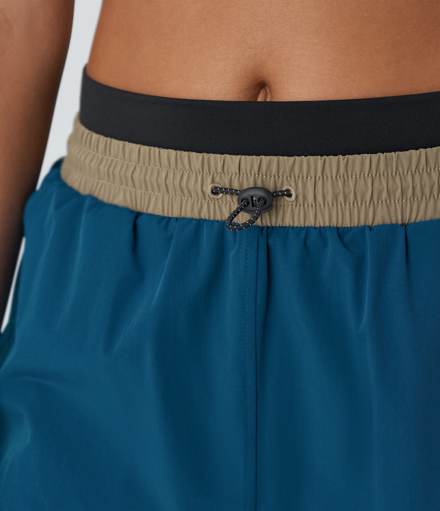 Pantalón corto senderismo 2 en 1 dobladillo curvo tiro medio bloque color reflectante cordón ajustable múltiple bolsillo