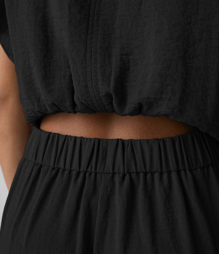 Criscross lace-up frill cap sleeve button cutout side pocket casual linen-style jumpsuit