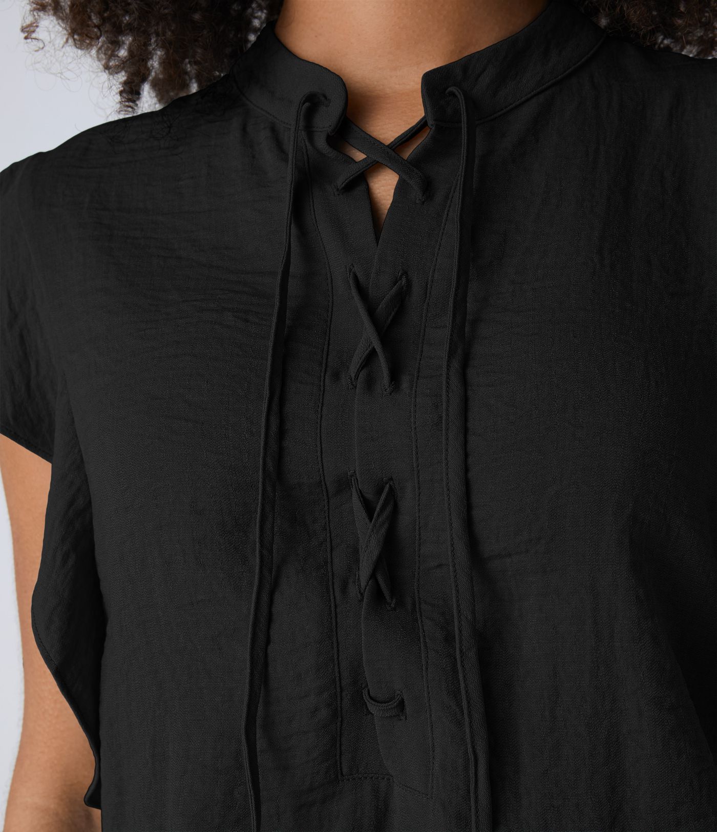 Criscross lace-up frill cap sleeve button cutout side pocket casual linen-style jumpsuit