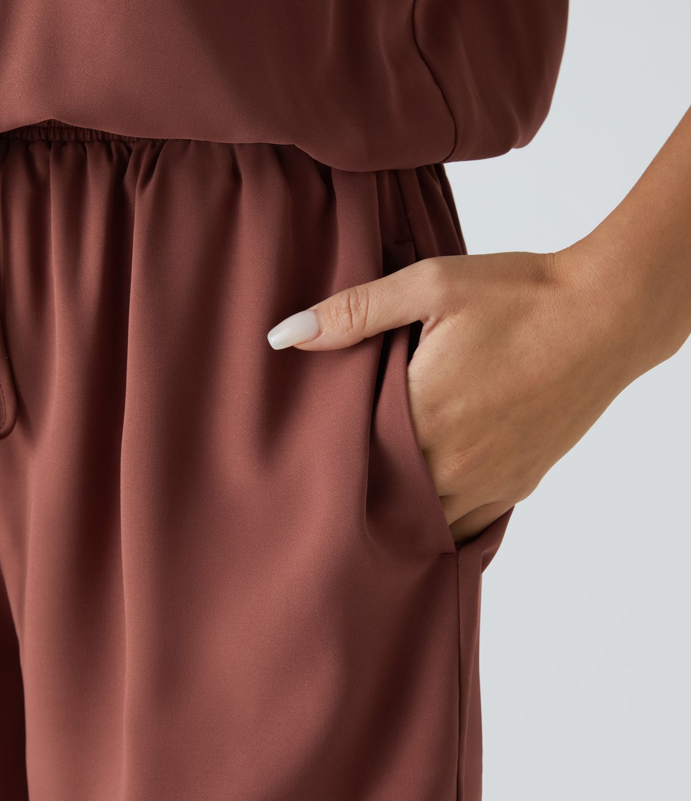 칼라가 있는 민소매 다중 포켓 드로스트링 주름 캐주얼 점프수트