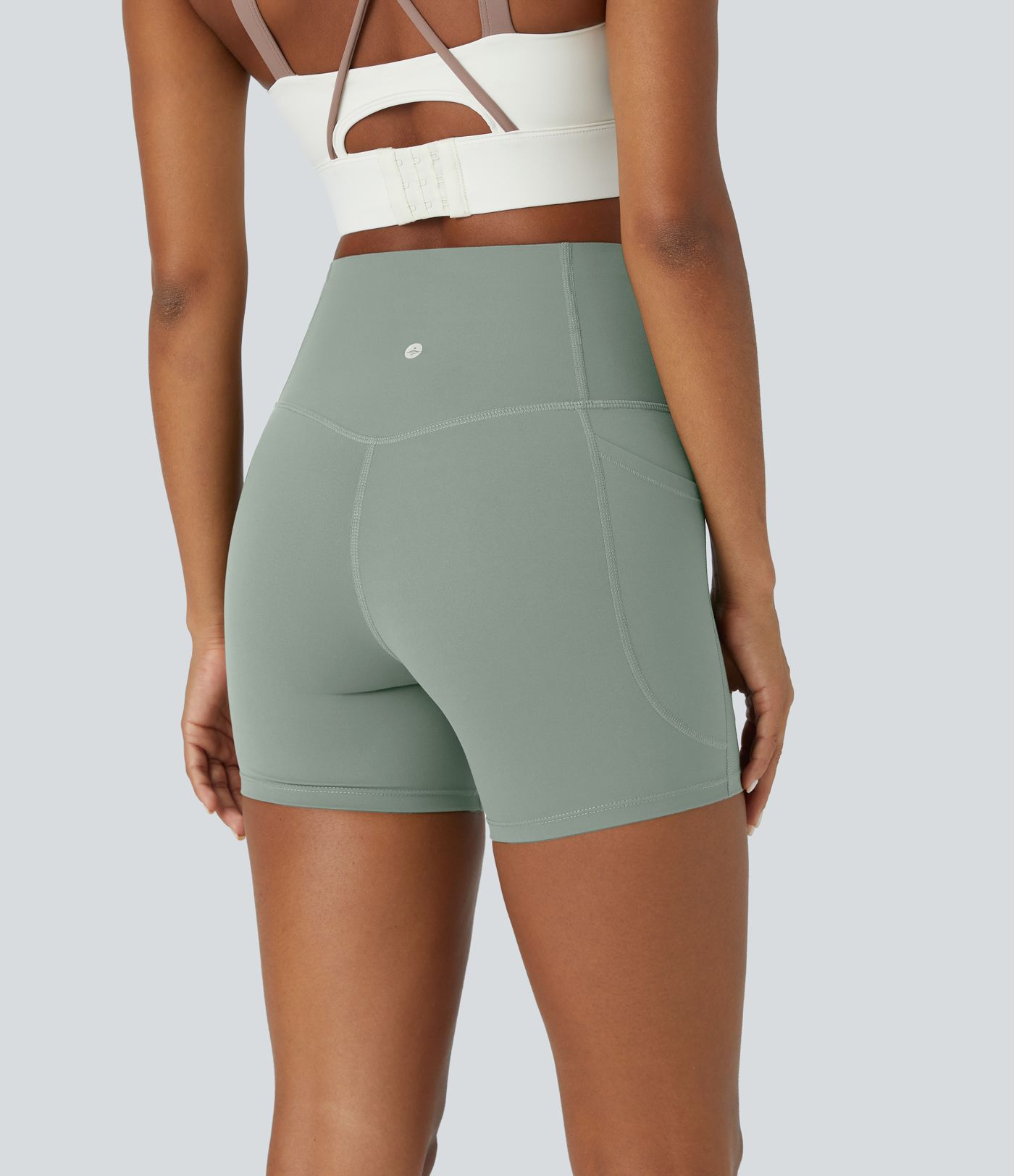 High-waisted, shaping bootcut yoga leggings with pockets by Halara UltraSculpt™