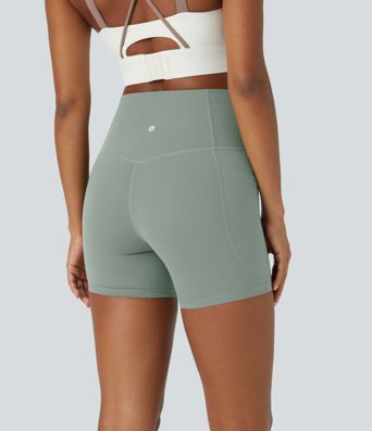 High-waisted, shaping bootcut yoga leggings with pockets by Halara UltraSculpt™