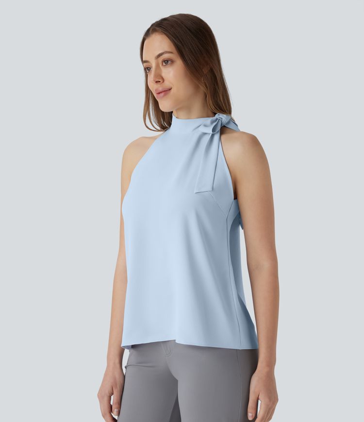 Blusa de oficina sin mangas con cuello halter y lazo decorativo