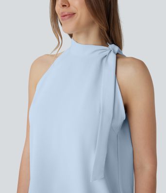 Blusa de oficina sin mangas con cuello halter y lazo decorativo