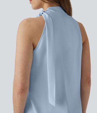 Blusa de oficina sin mangas con cuello halter y lazo decorativo