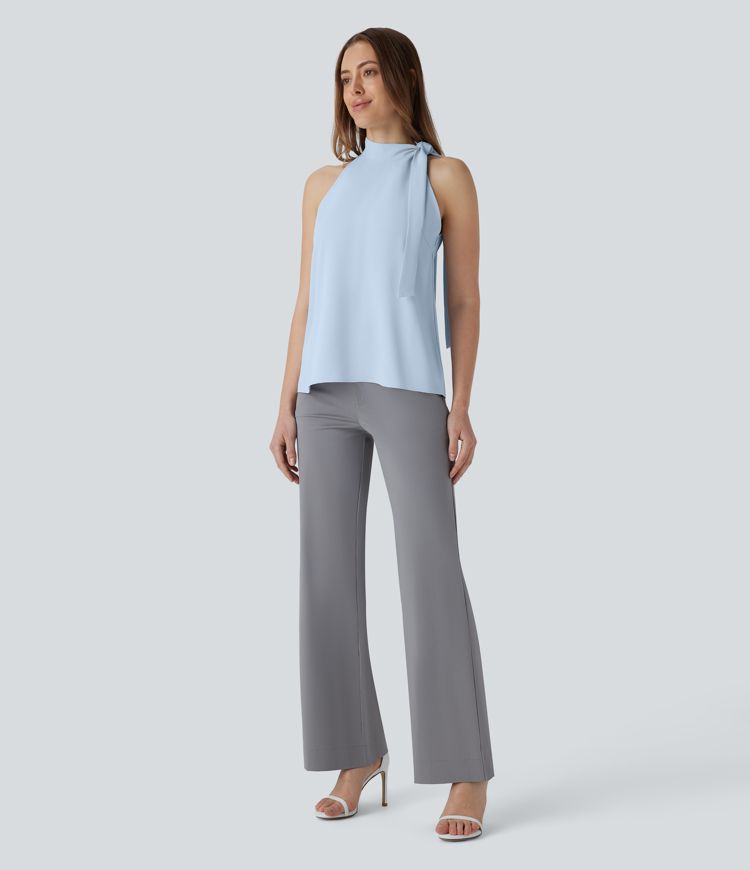 Blusa de oficina sin mangas con cuello halter y lazo decorativo