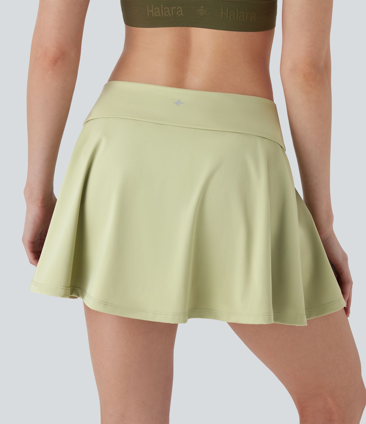 Falda de yoga mini 2 en 1 de tiro muy bajo con pliegues y bolsillos