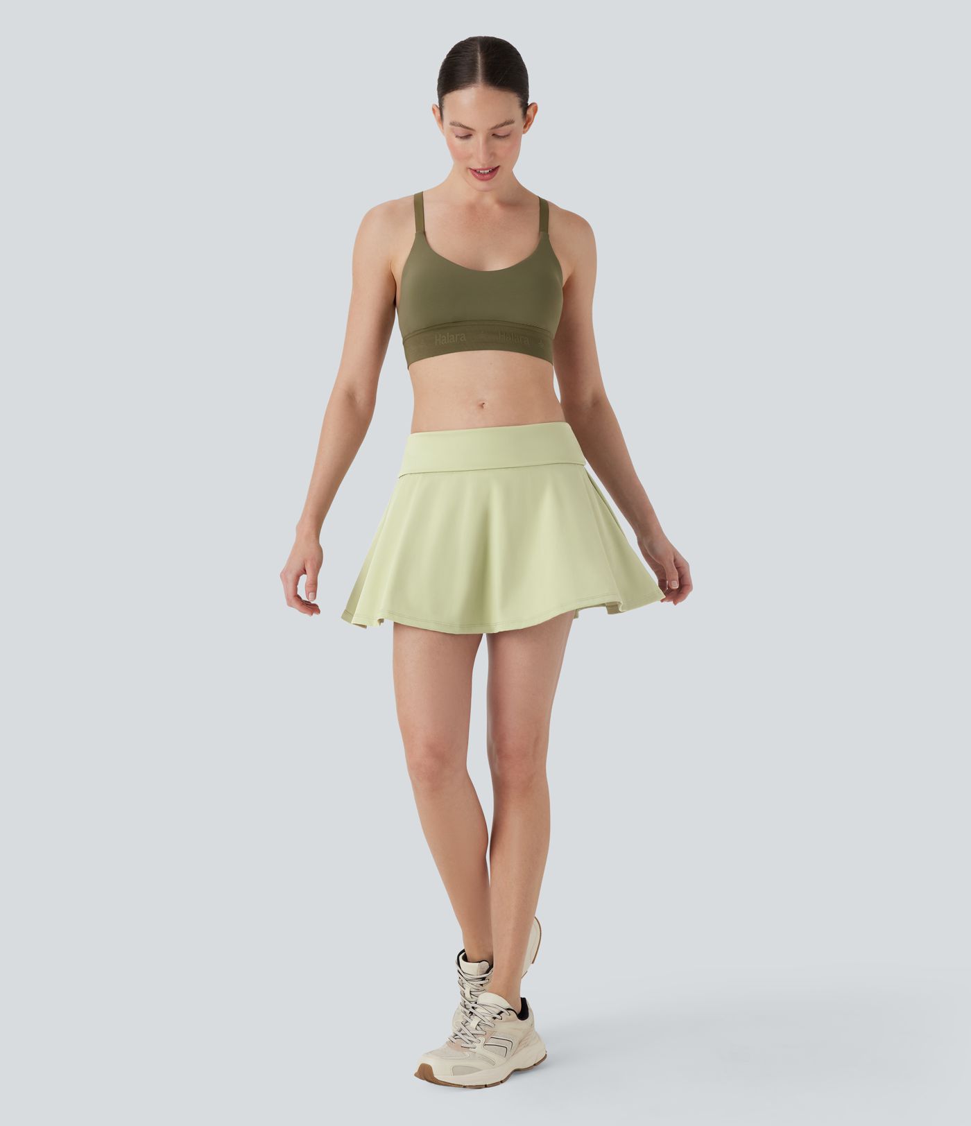 Falda de yoga mini 2 en 1 de tiro muy bajo con pliegues y bolsillos