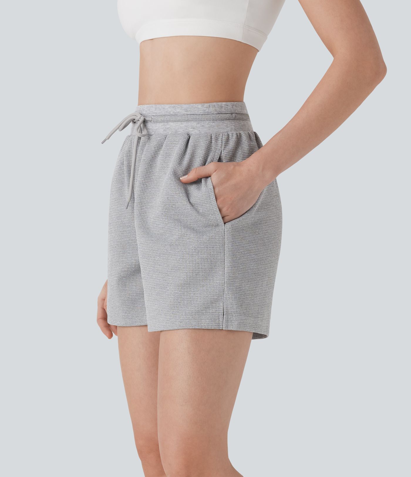 Shorts de yoga de tiro alto con cordón y bolsillos laterales