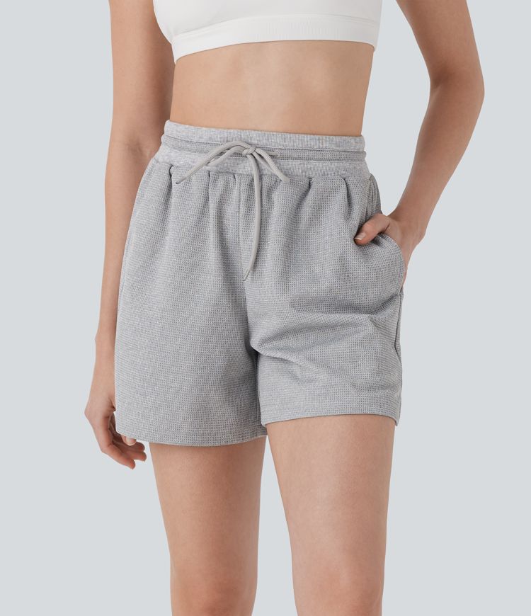Shorts de yoga de tiro alto con cordón y bolsillos laterales