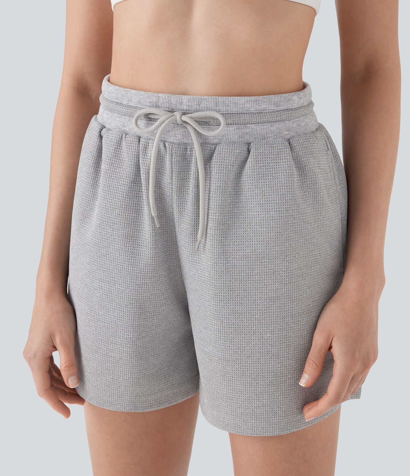 Shorts de yoga de tiro alto con cordón y bolsillos laterales