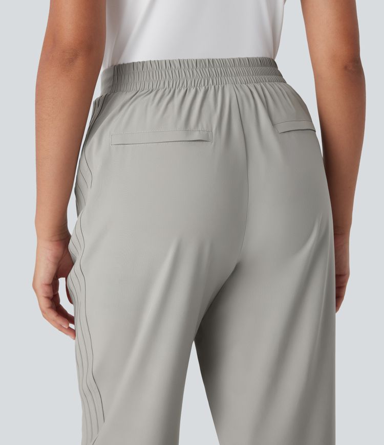 Pantalones de viaje Breezeful™ ajustados de tiro alto de secado rápido con bolsillos laterales