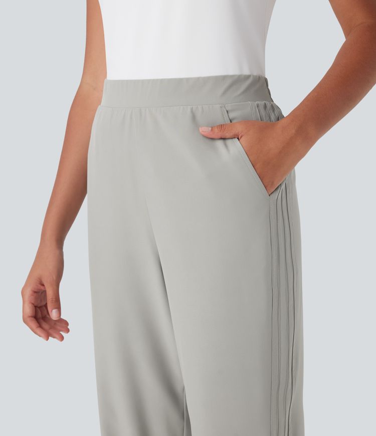 Pantalones de viaje Breezeful™ ajustados de tiro alto de secado rápido con bolsillos laterales