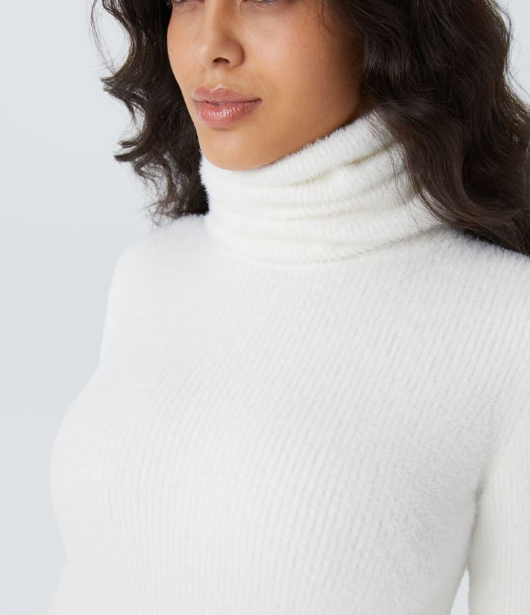 Suéter ajustado manga larga cuello alto apilado