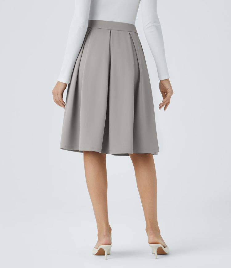 Jupe de travail mi-longue plissée en crêpe à taille haute avec poches latérales