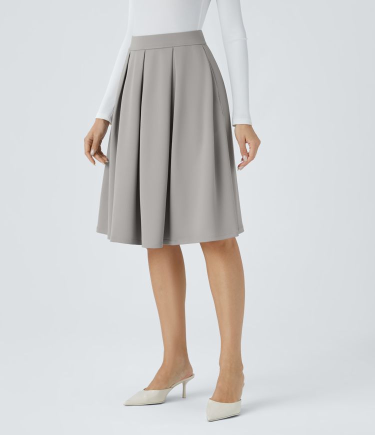 Jupe de travail mi-longue plissée en crêpe à taille haute avec poches latérales