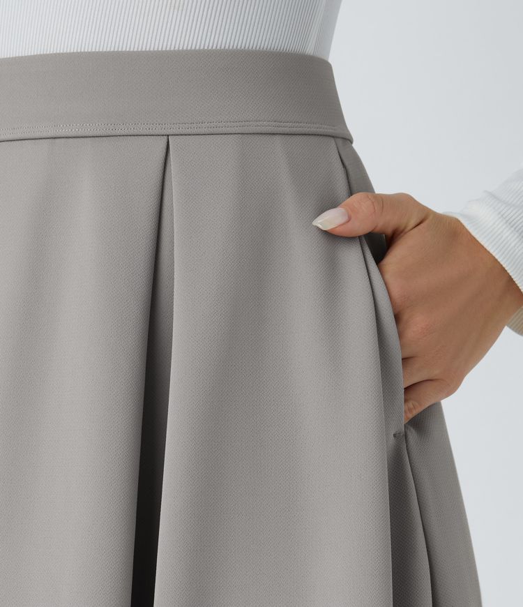 Jupe de travail mi-longue plissée en crêpe à taille haute avec poches latérales