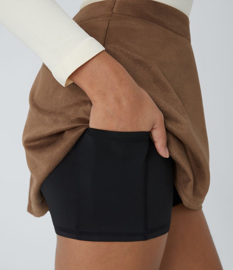 Minifalda gamuza tiro alto lazo lateral bolsillo 2 en 1