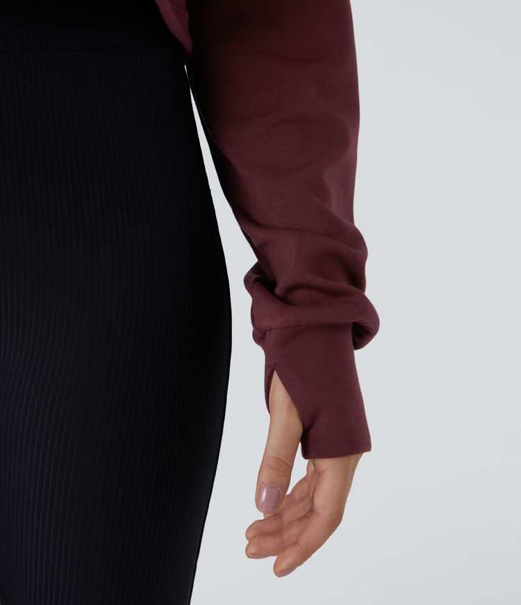 Sweat-shirt court décontracté avec demi-zip, passe-pouces et cordon ajustable à l'ourlet