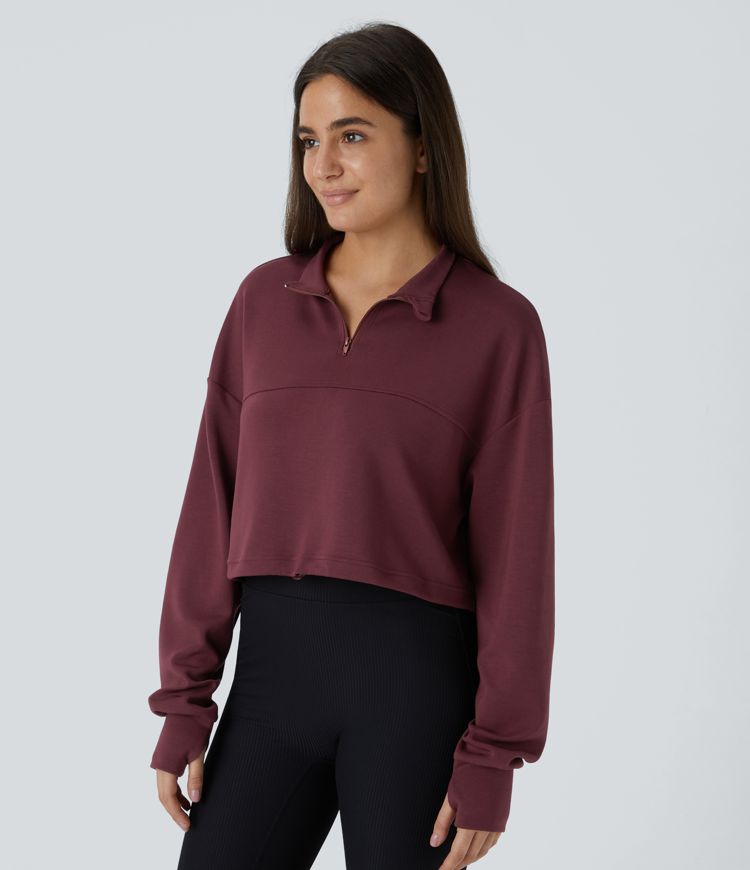 Sweat-shirt court décontracté avec demi-zip, passe-pouces et cordon ajustable à l'ourlet