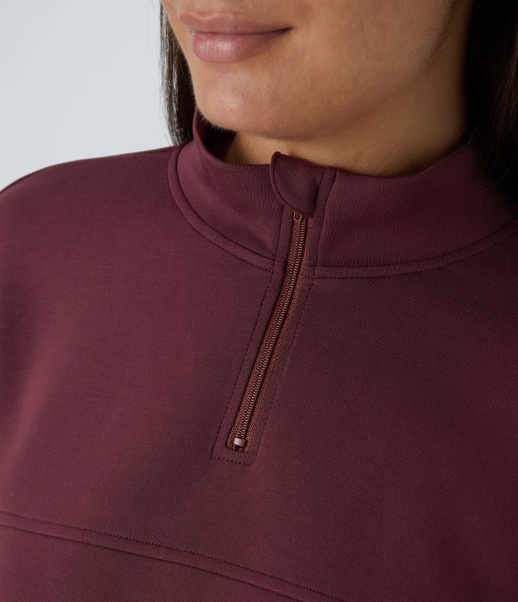 Sweat-shirt court décontracté avec demi-zip, passe-pouces et cordon ajustable à l'ourlet