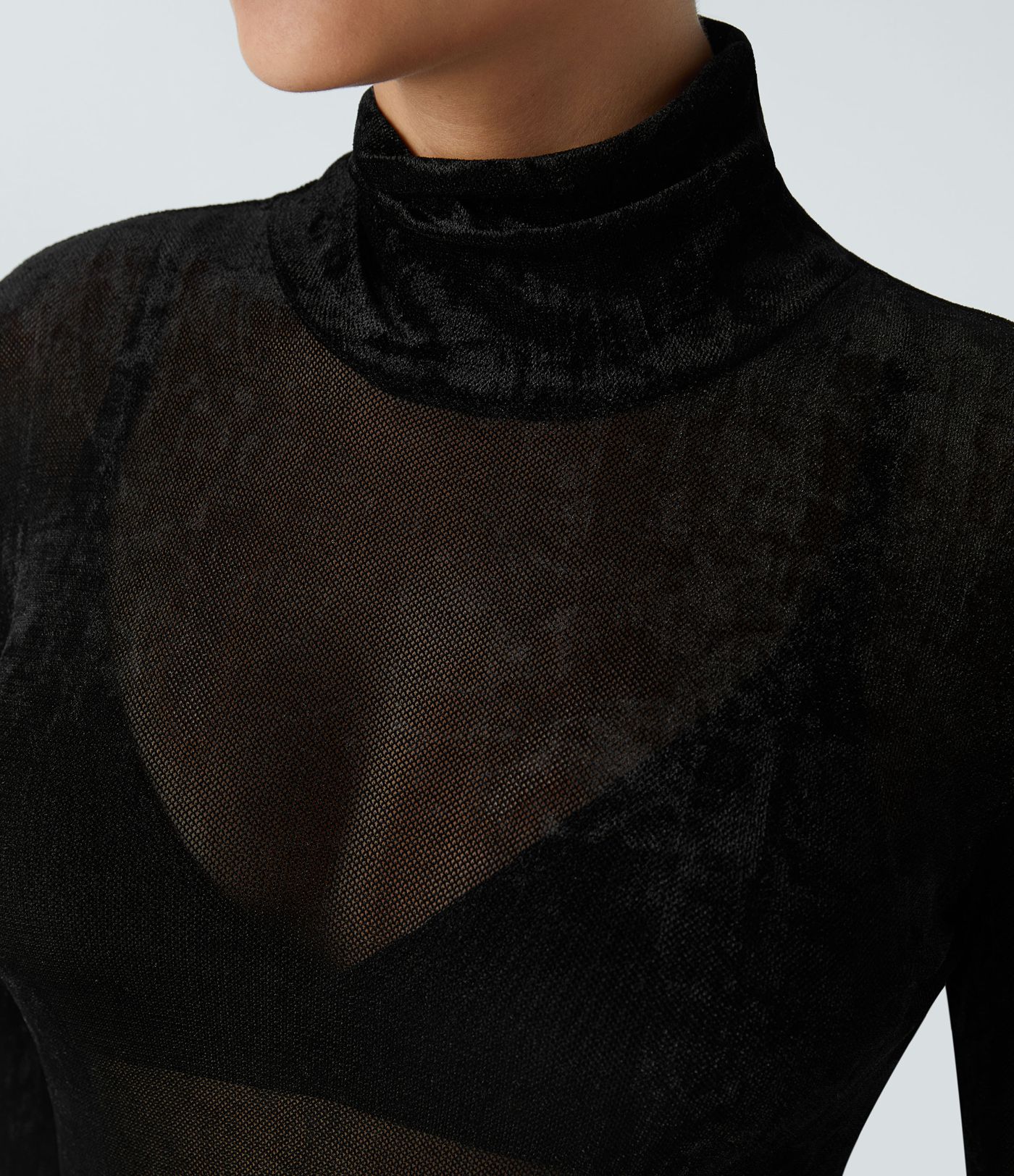 Haut décontracté transparent en velours à col montant et manches longues