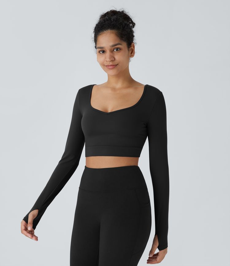 Top Softlyzero™ Plush deportivo yoga abertura pulgar diseño retorcido recortado