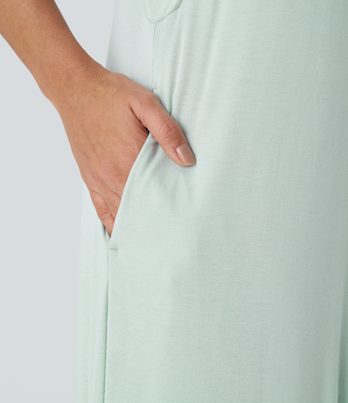 Sooniline V-kaelusega, taskutega, vaba stiiliga harem-kombinesoon