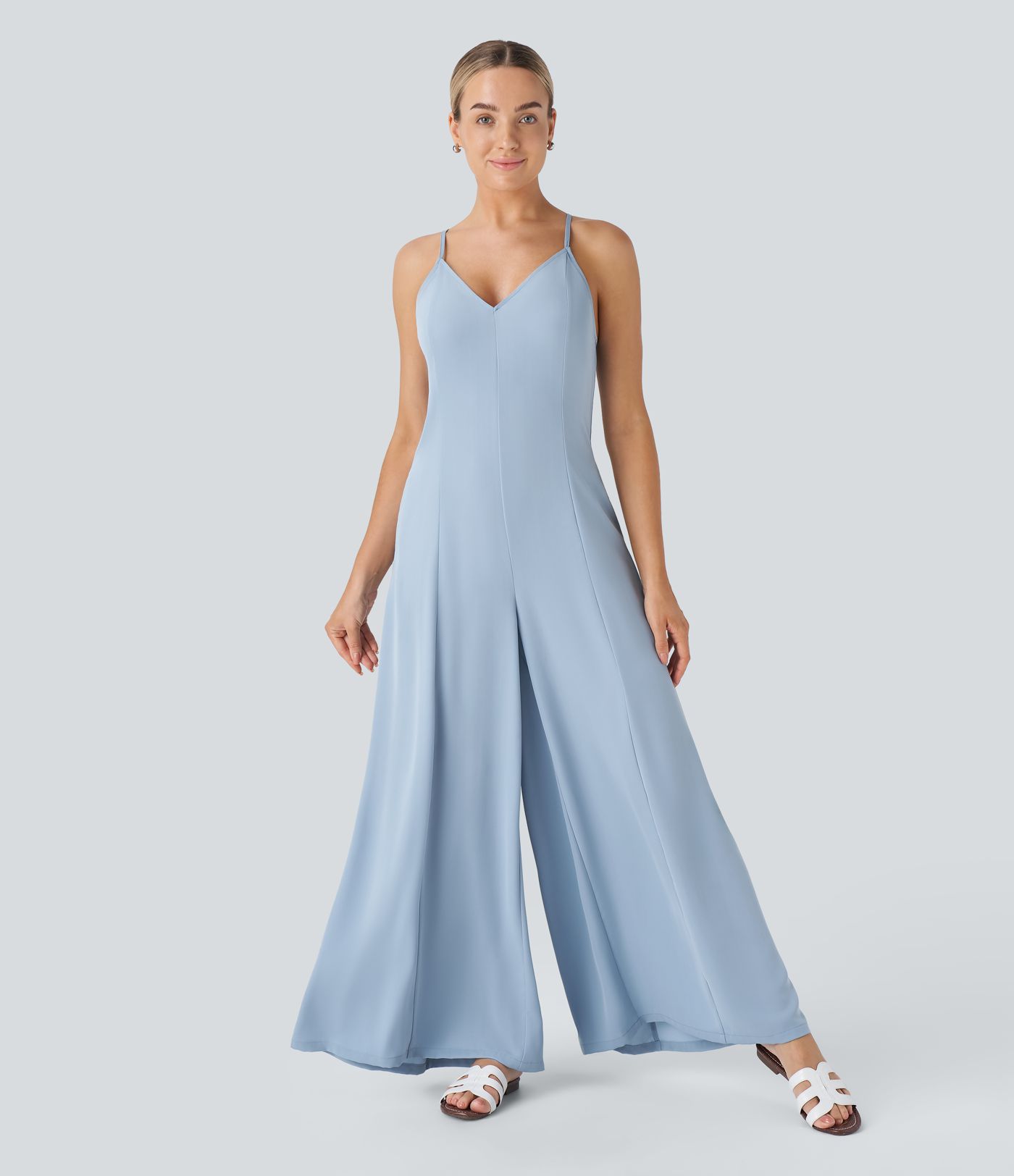 Backless crisscross lace-up with adjustable straps hidden zipper side pockets wide leg resort jumpsuit