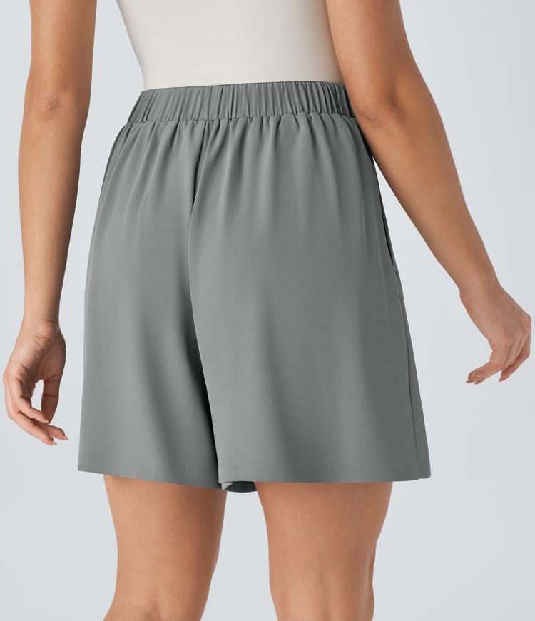 Pantalón corto oficina plisado bolsillo lateral botón decorativo tiro alto