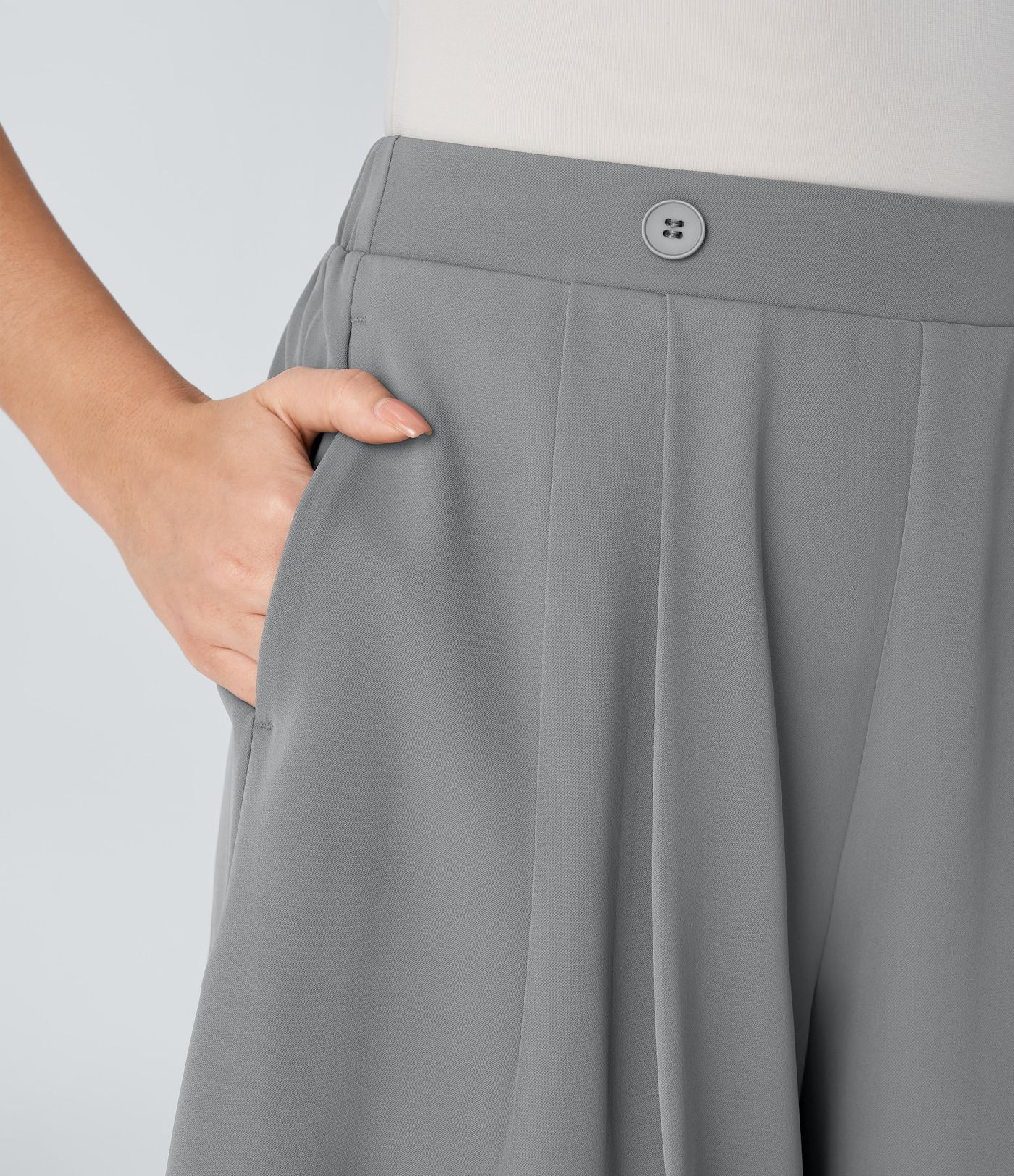 Pantalón corto oficina plisado bolsillo lateral botón decorativo tiro alto