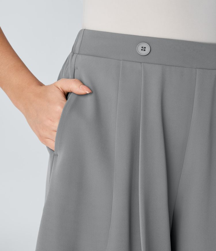 Pantalón corto oficina plisado bolsillo lateral botón decorativo tiro alto