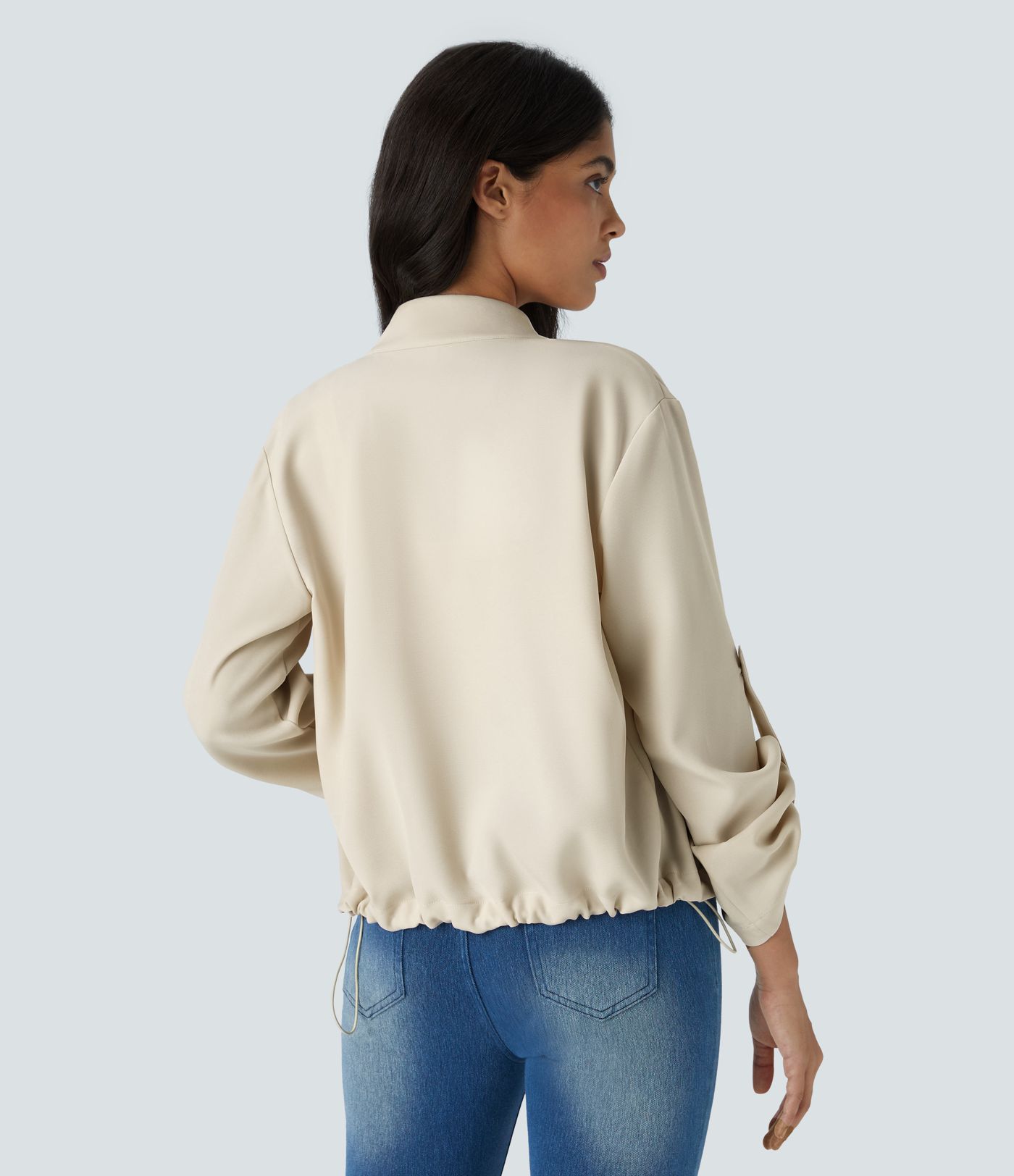 Stand collar Roll tab Sleeves Flap pocket Drawstring inside Hem zip Casual jacket